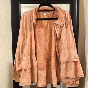 Free People peachish colored windbreaker! Size medium